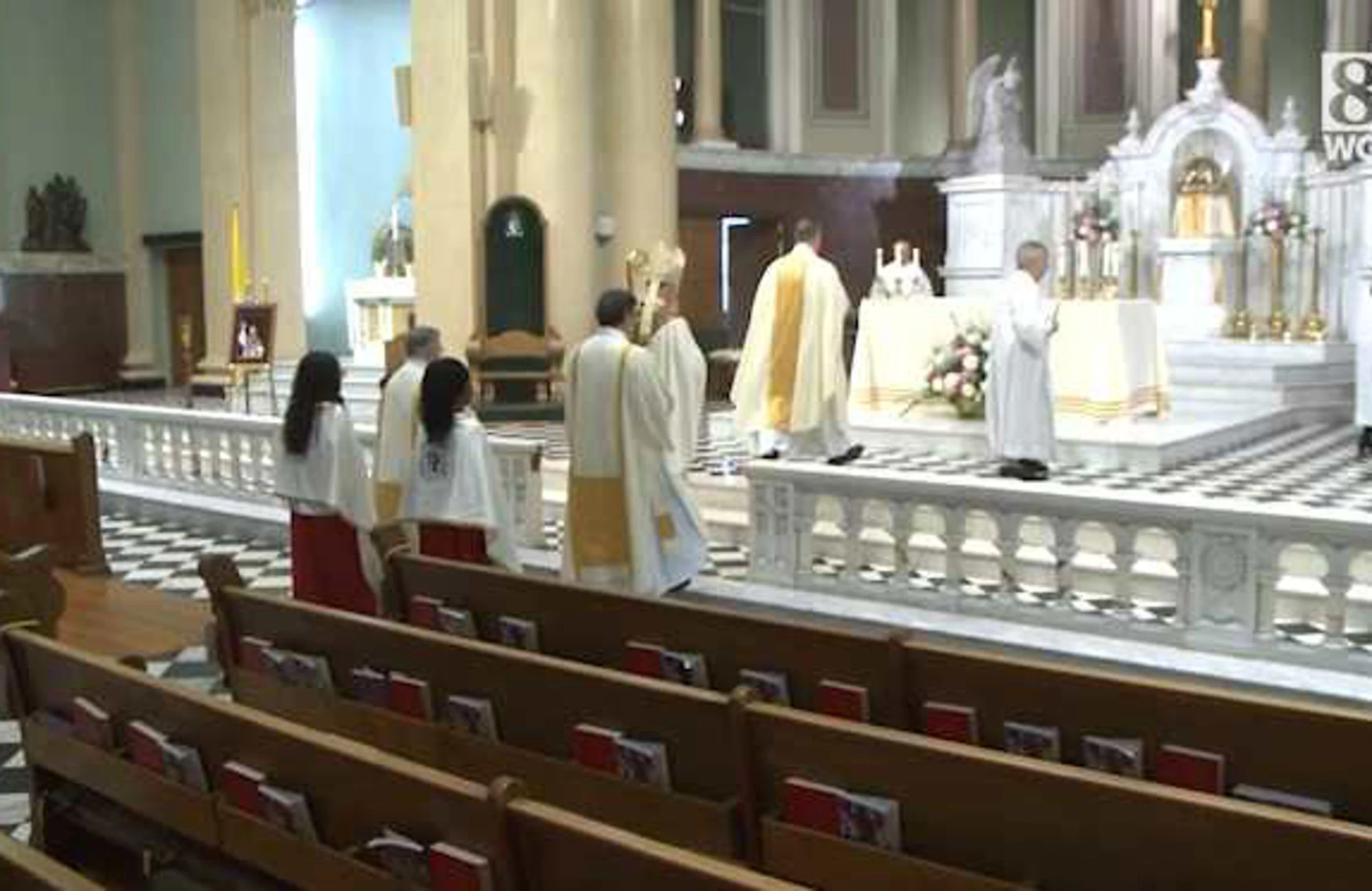The bishop celebrating Mass at St. Francis of Assisi