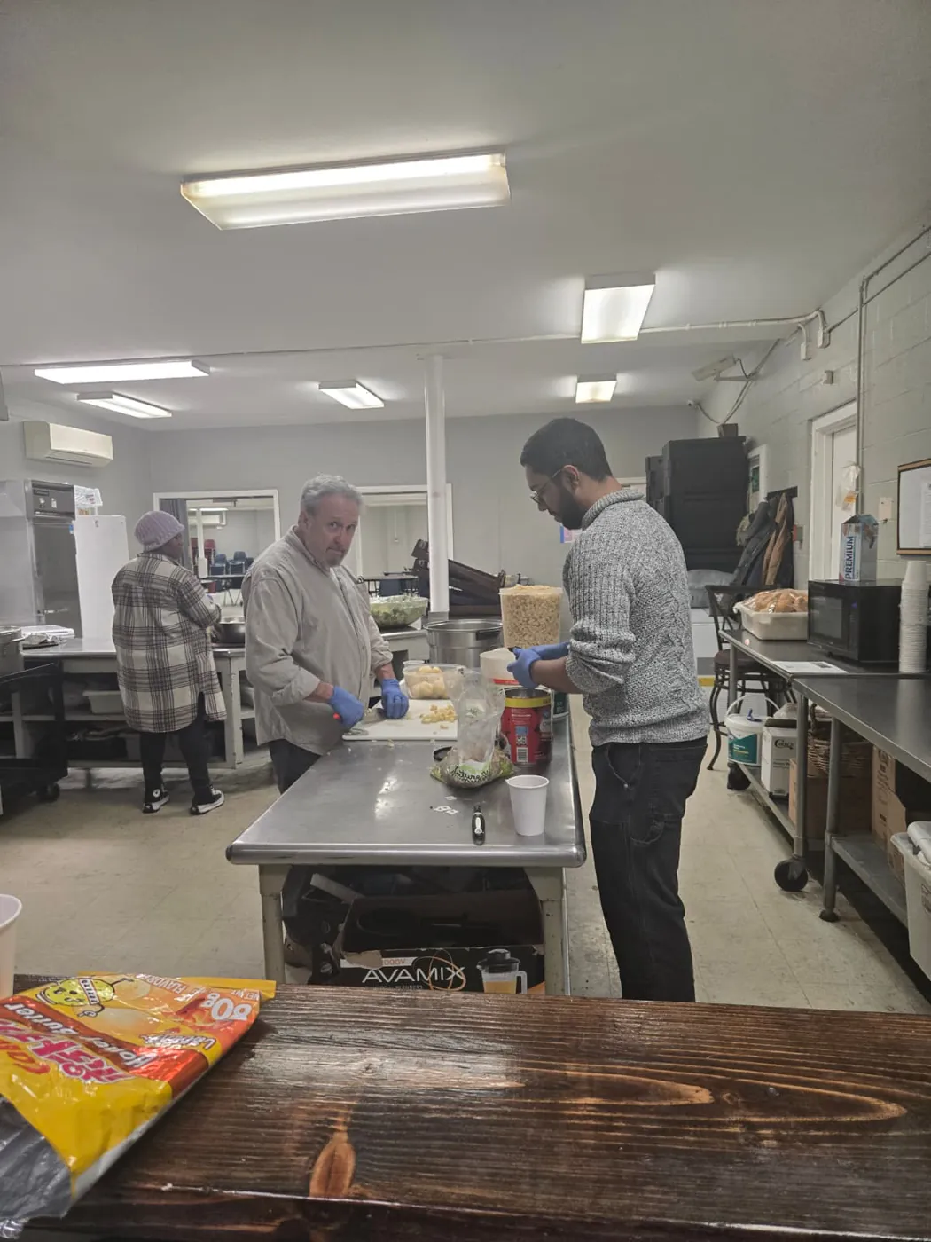 A volunteer in the St. Francis soup kitchen on Market Street, Allison Hill