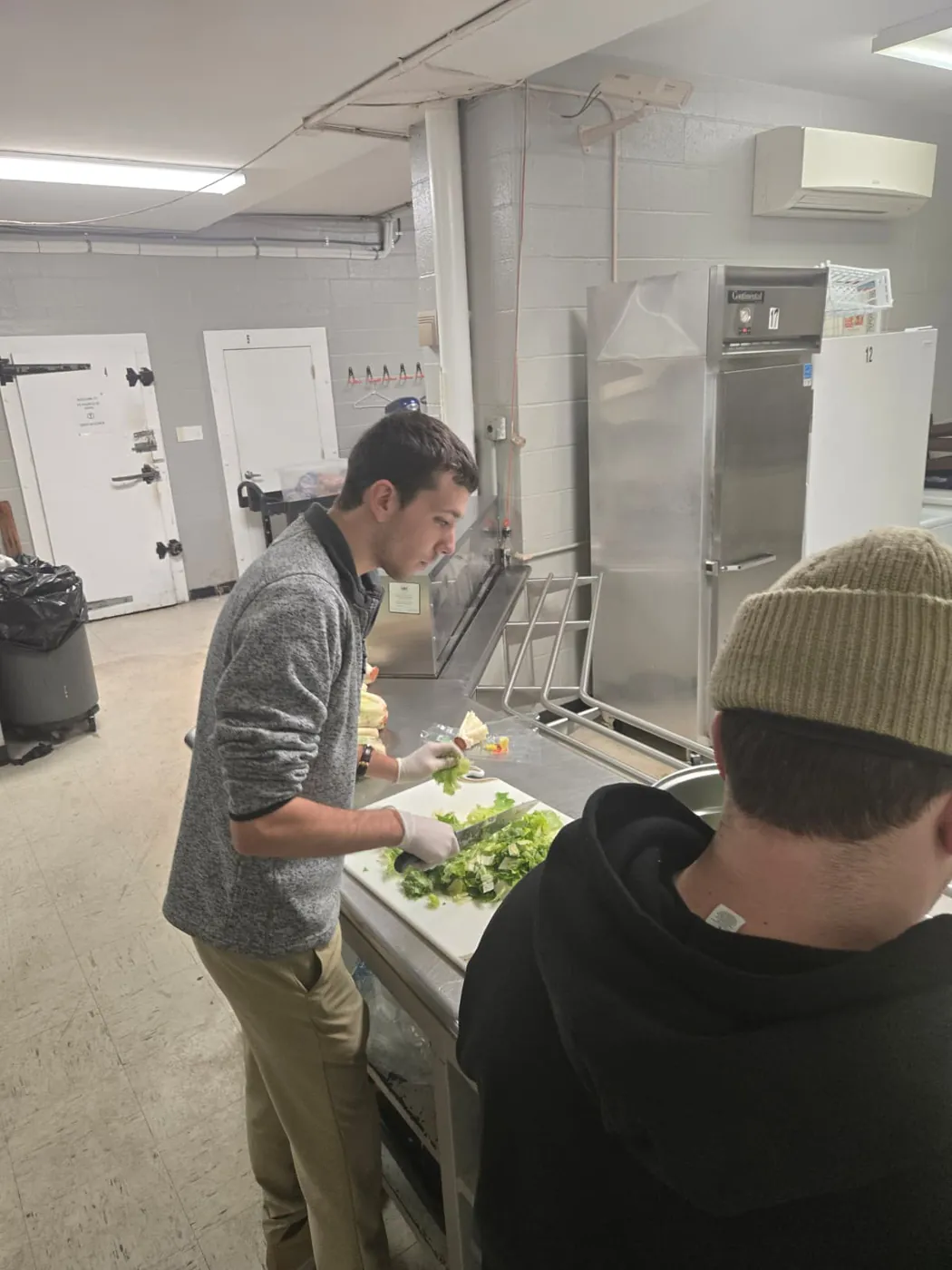 A volunteer in the St. Francis soup kitchen on Market Street, Allison Hill