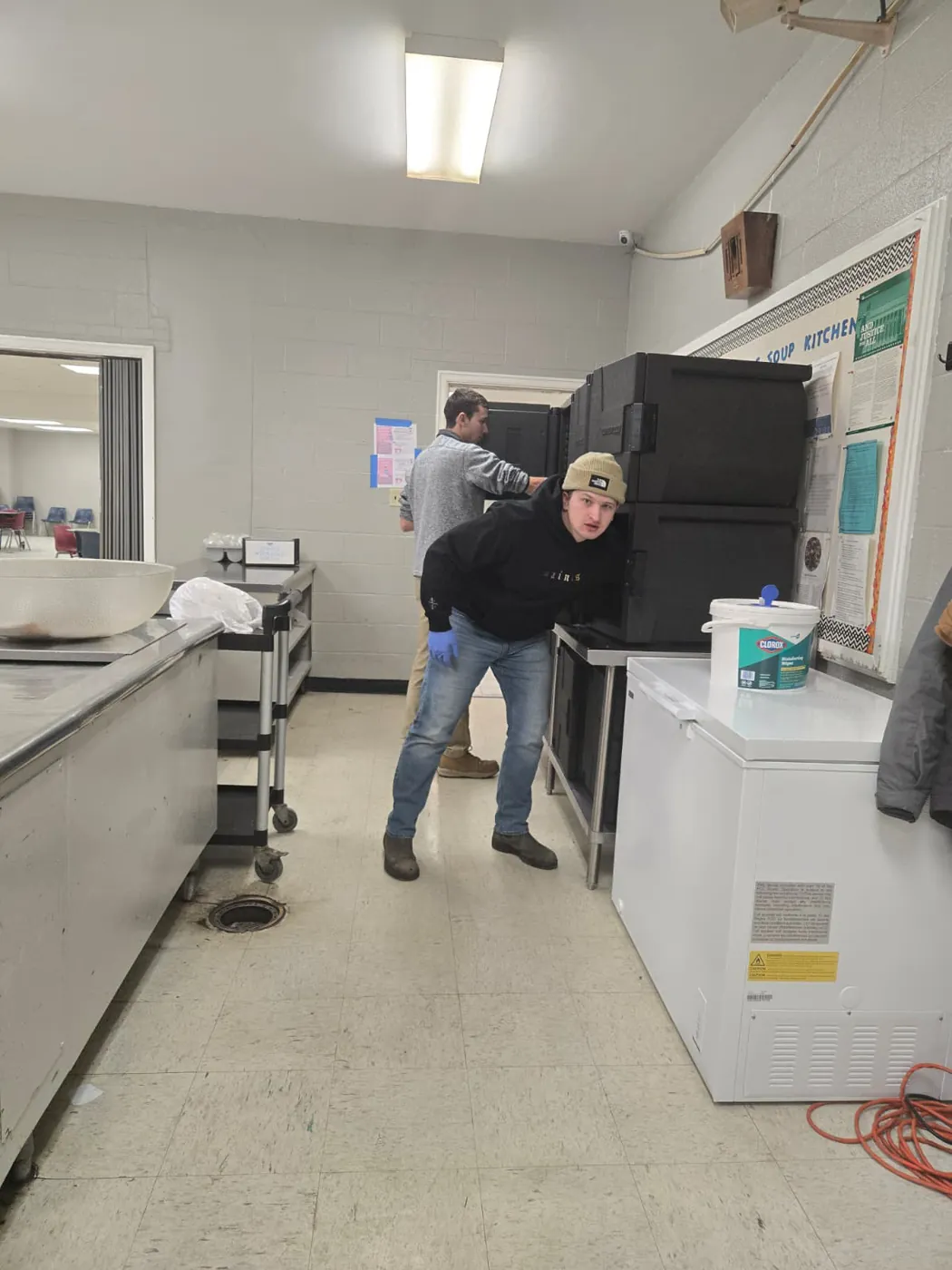 A volunteer in the St. Francis soup kitchen on Market Street, Allison Hill
