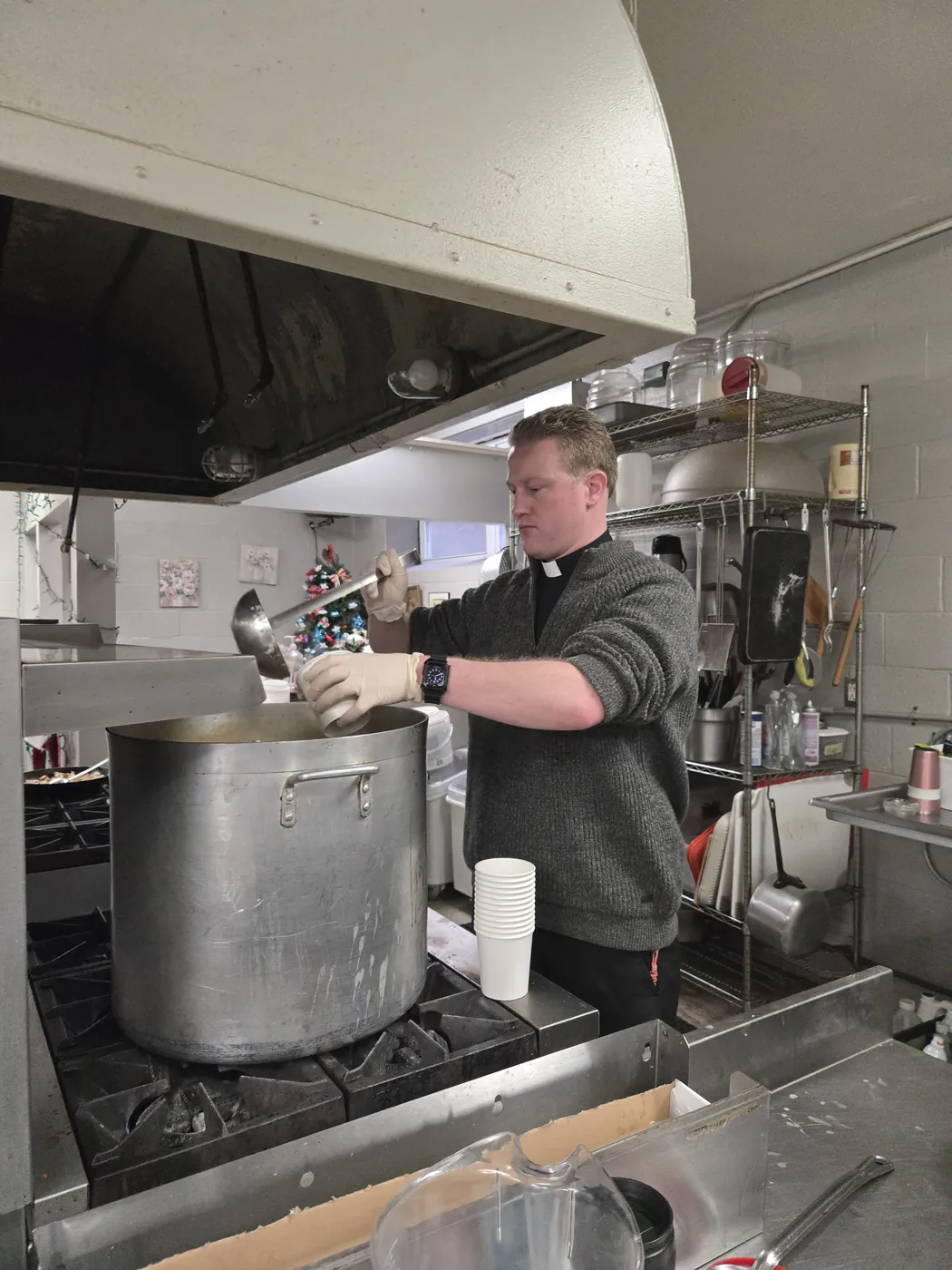A volunteer in the St. Francis soup kitchen on Market Street, Allison Hill