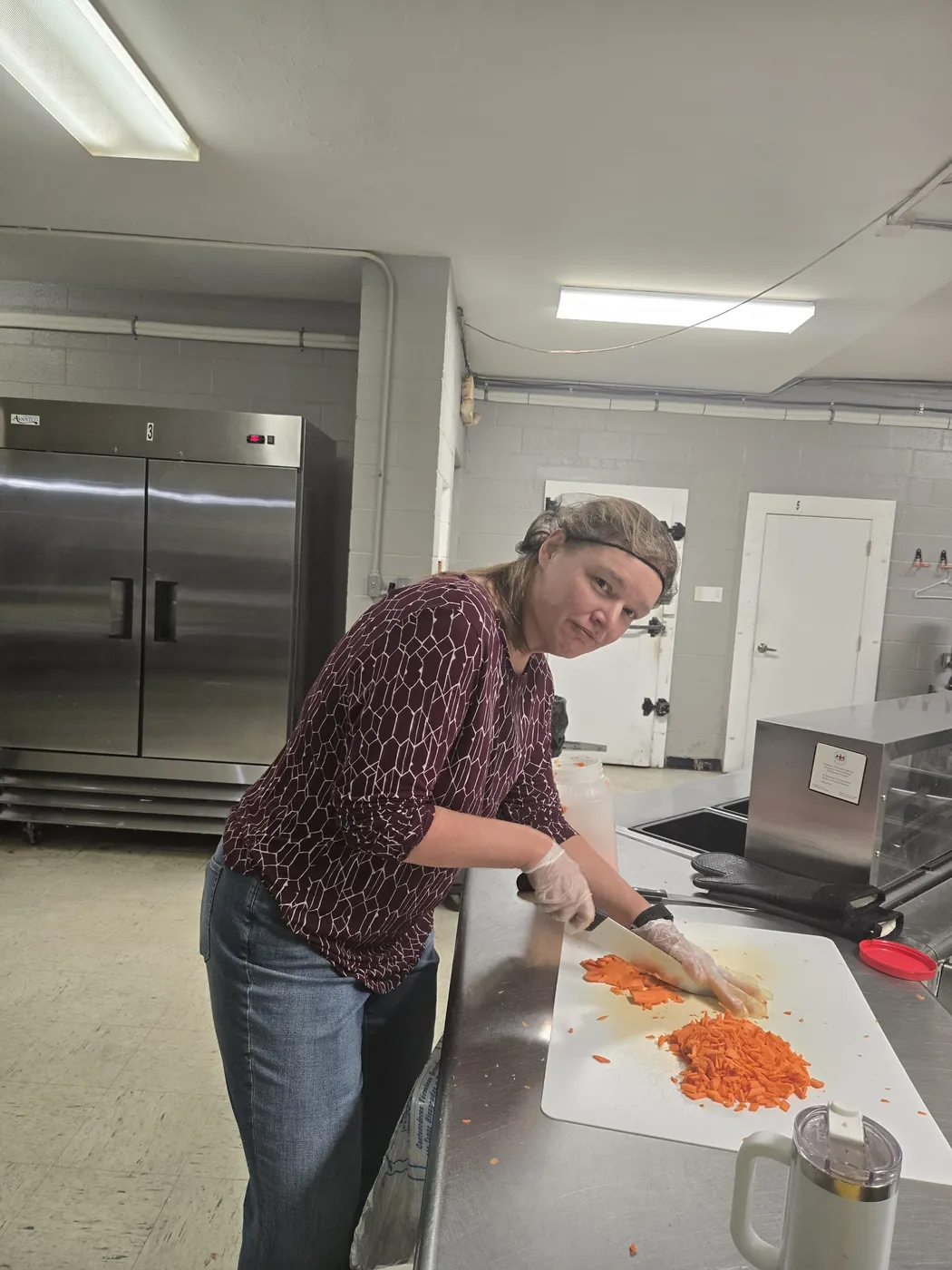 A volunteer in the St. Francis soup kitchen on Market Street, Allison Hill