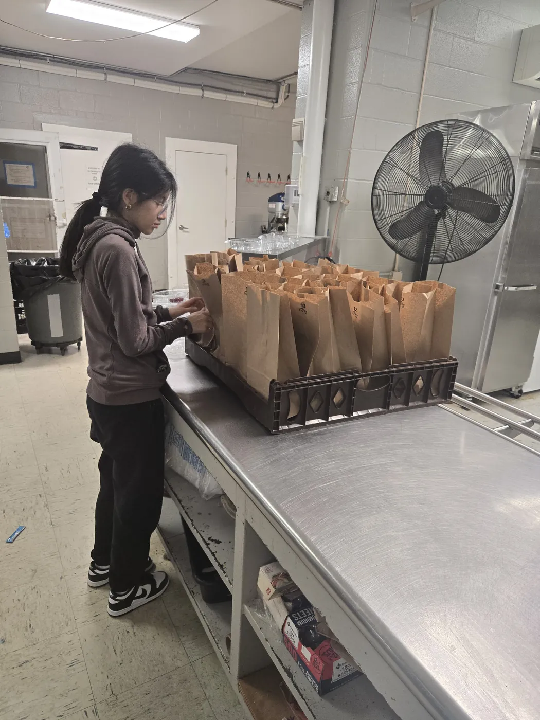 A volunteer in the St. Francis soup kitchen on Market Street, Allison Hill