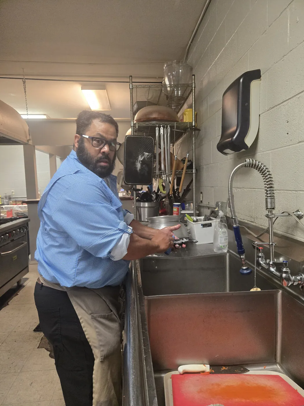 A volunteer in the St. Francis soup kitchen on Market Street, Allison Hill