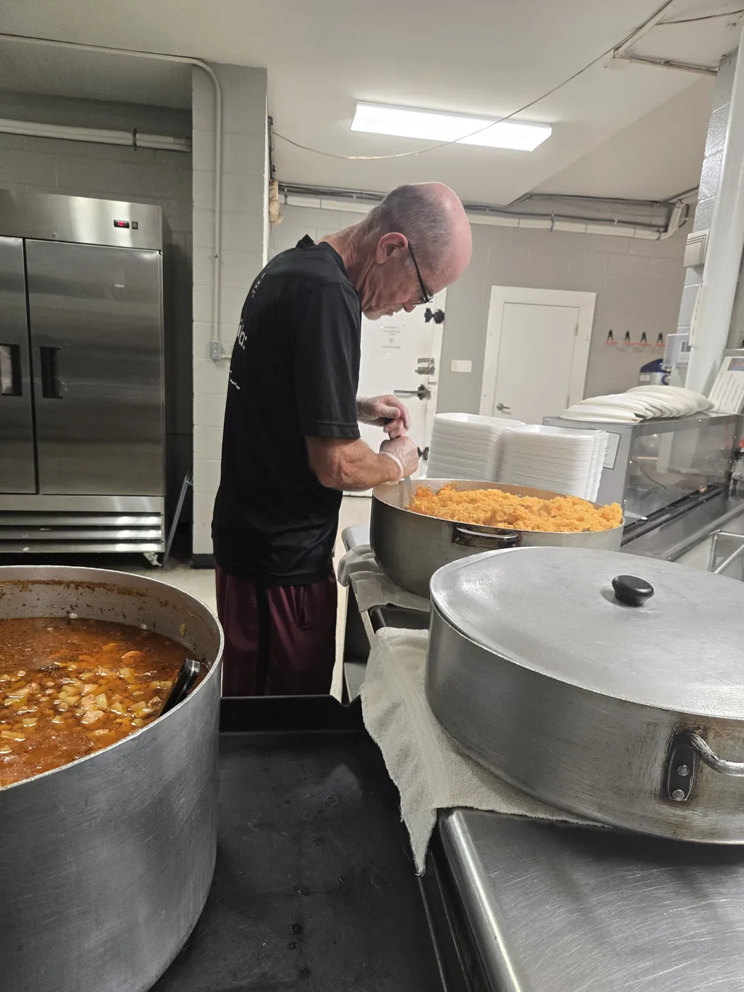 A volunteer in the St. Francis soup kitchen on Market Street, Allison Hill