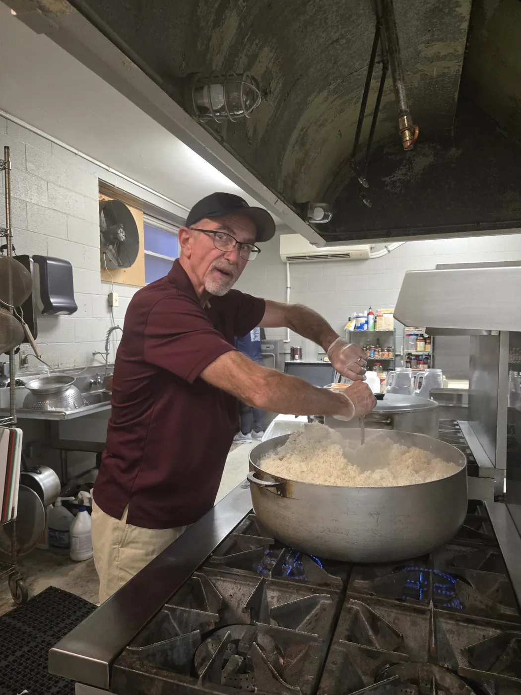 A volunteer in the St. Francis soup kitchen on Market Street, Allison Hill
