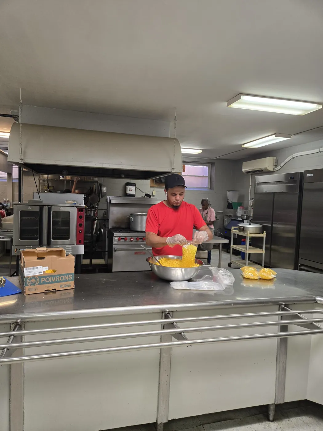 A volunteer in the St. Francis soup kitchen on Market Street, Allison Hill