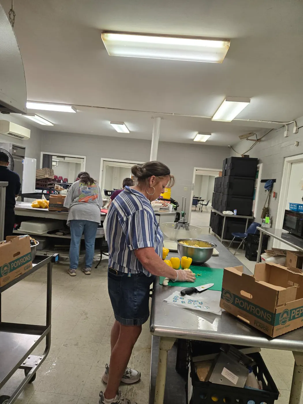 A volunteer in the St. Francis soup kitchen on Market Street, Allison Hill
