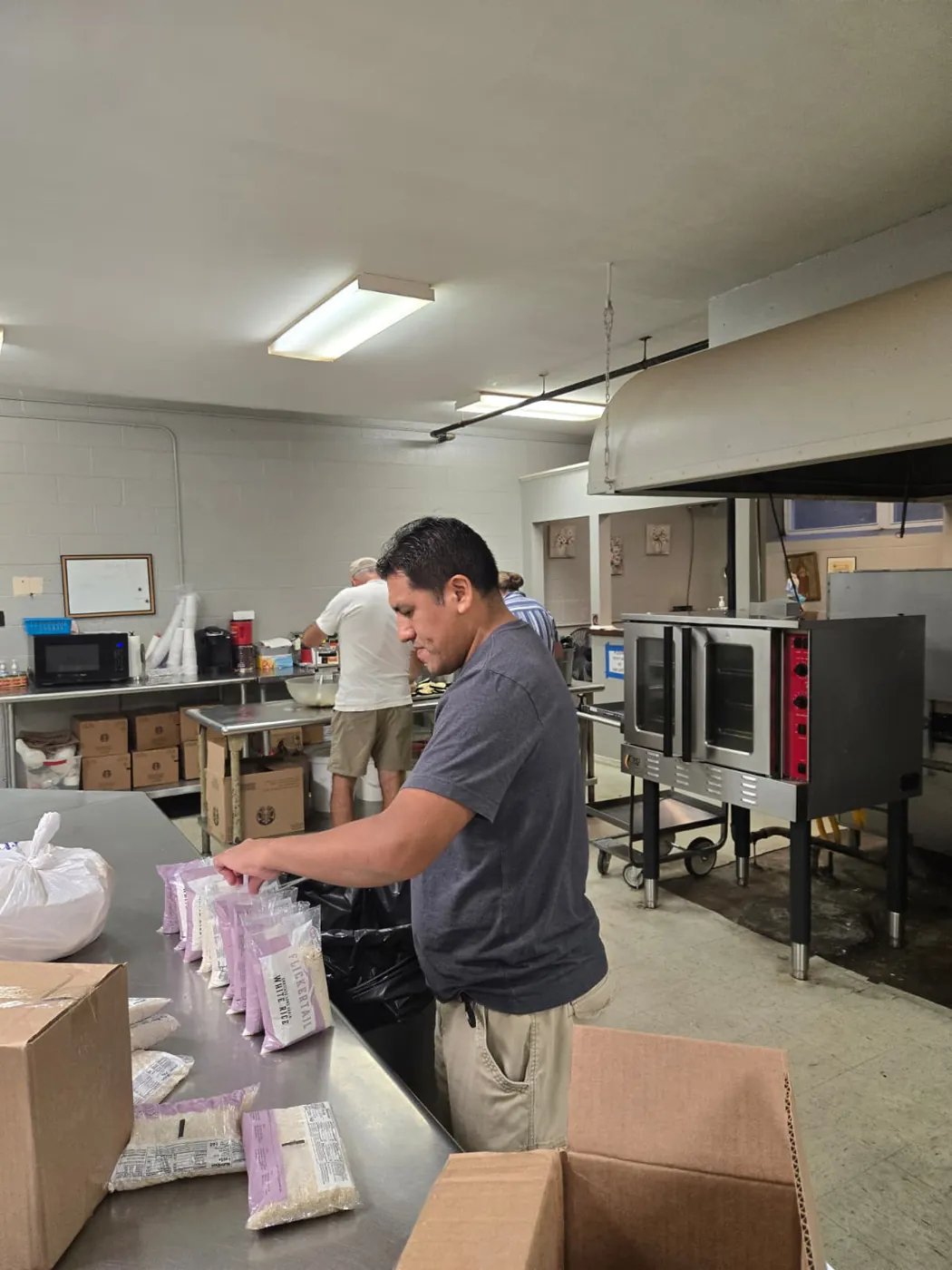 A volunteer in the St. Francis soup kitchen on Market Street, Allison Hill