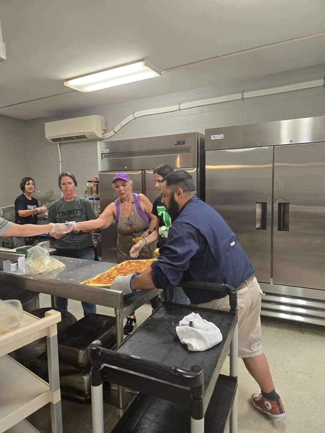 A volunteer in the St. Francis soup kitchen on Market Street, Allison Hill