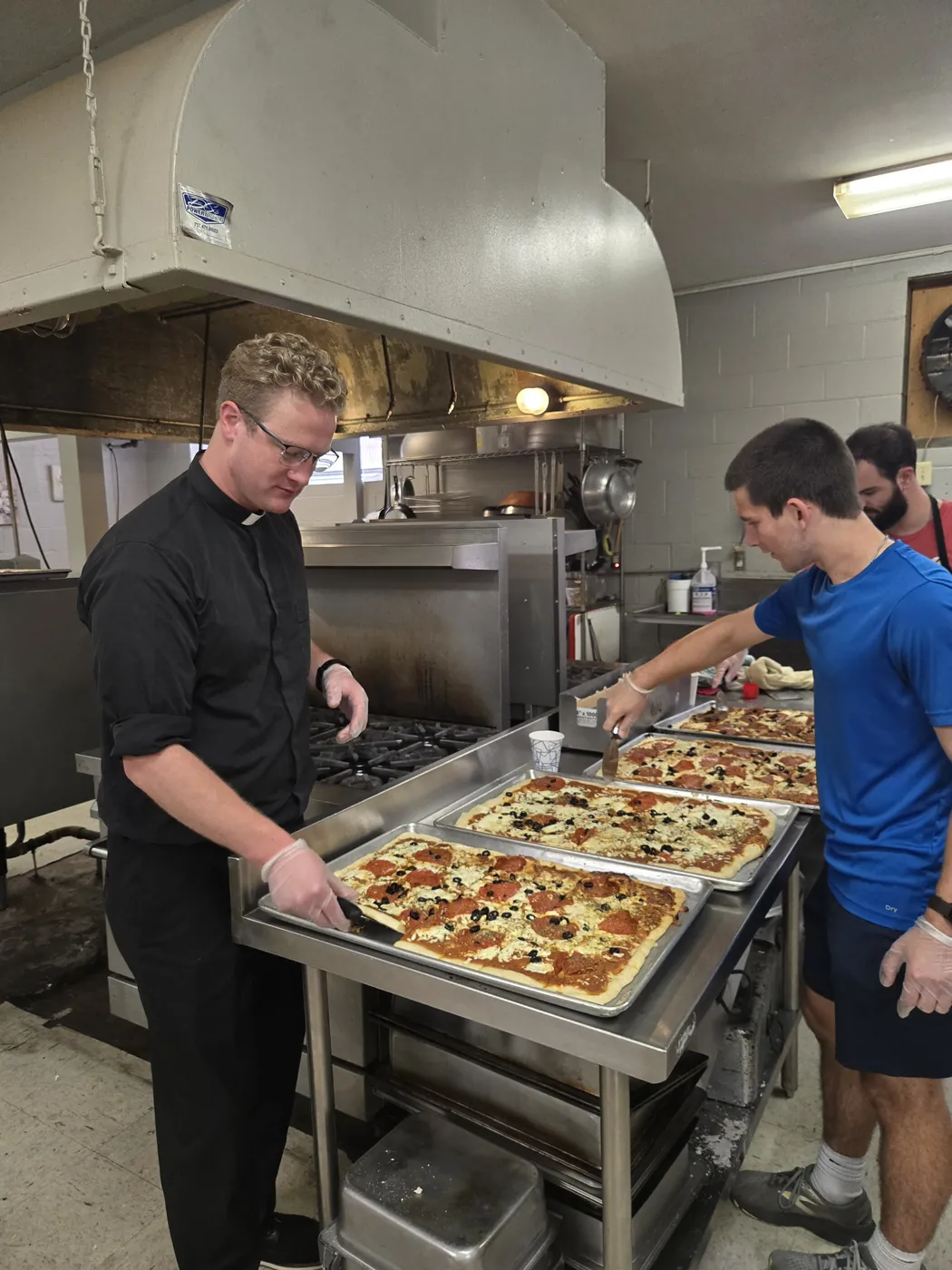 A volunteer in the St. Francis soup kitchen on Market Street, Allison Hill