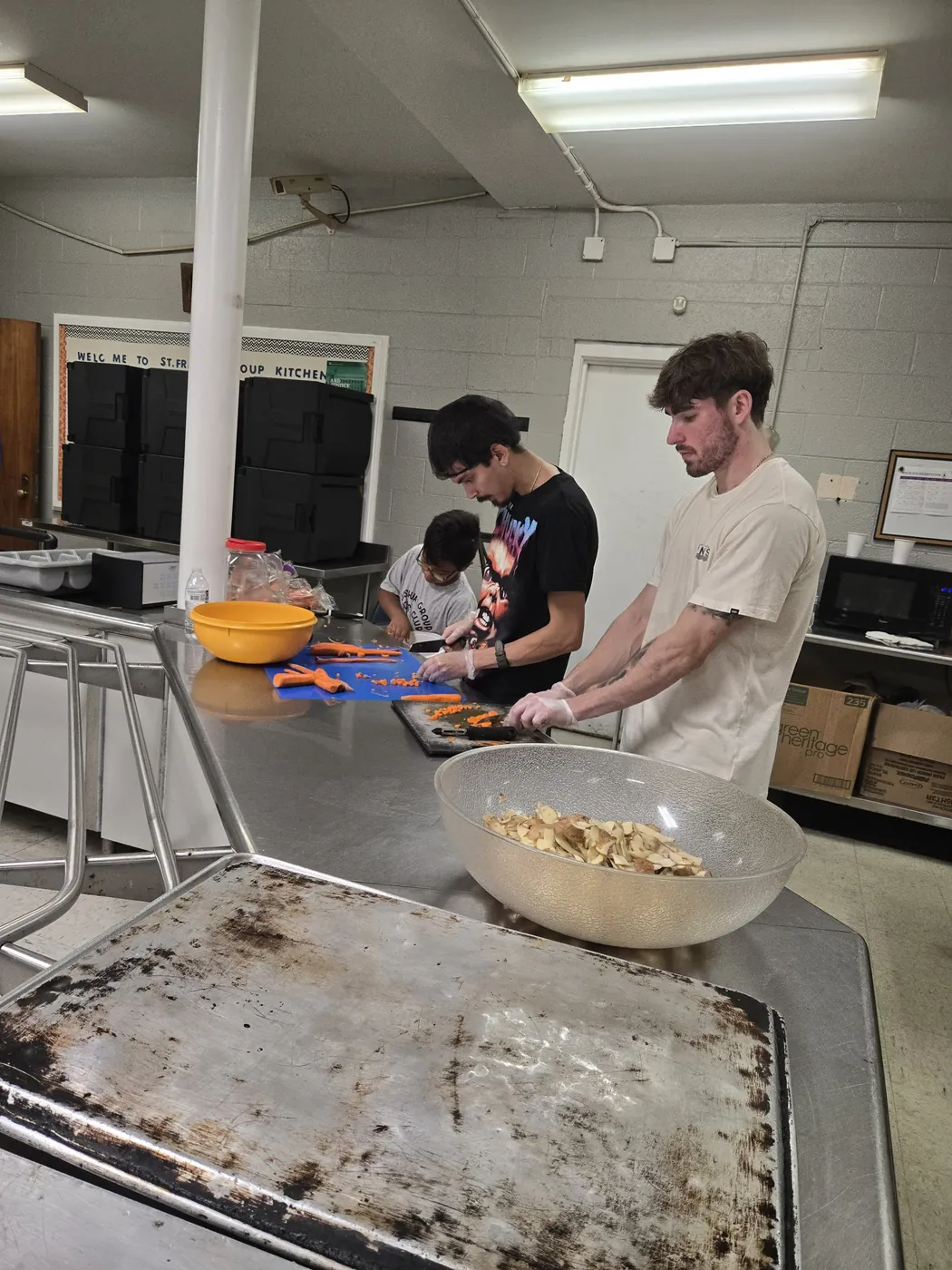 A volunteer in the St. Francis soup kitchen on Market Street, Allison Hill