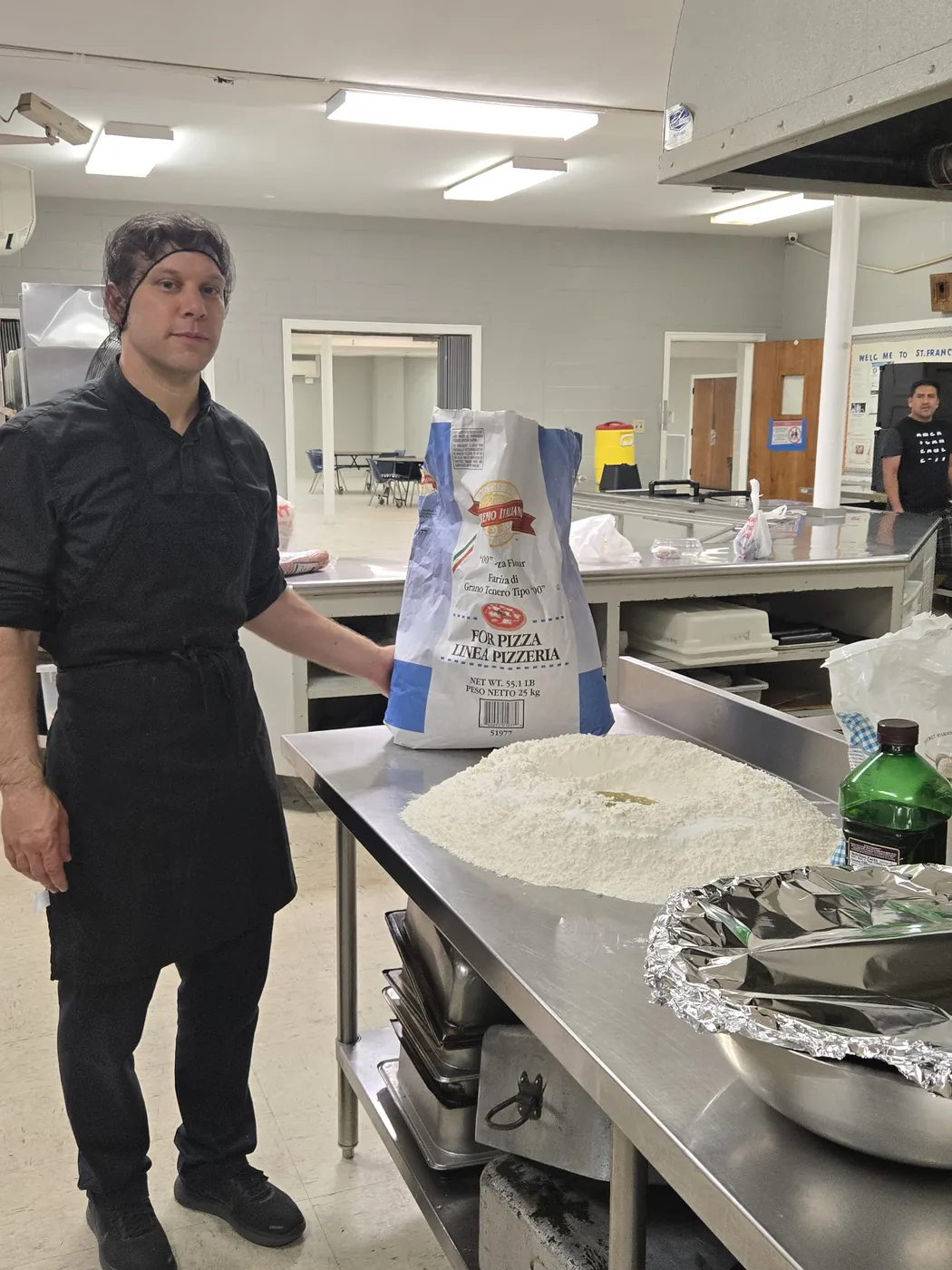 A volunteer in the St. Francis soup kitchen on Market Street, Allison Hill