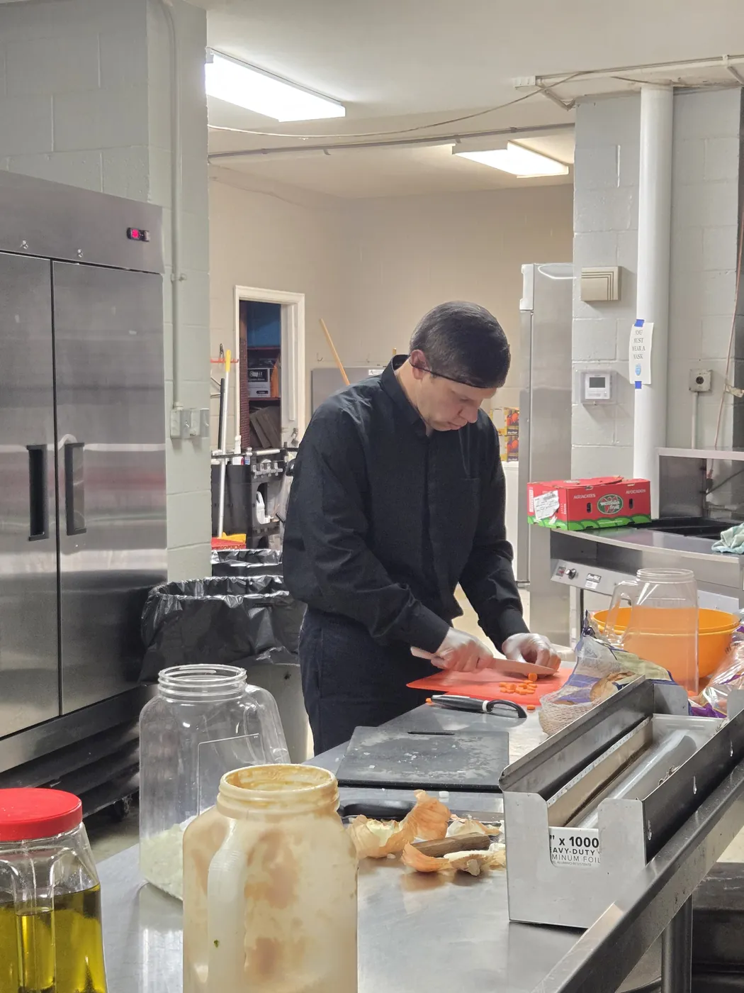 A volunteer in the St. Francis soup kitchen on Market Street, Allison Hill